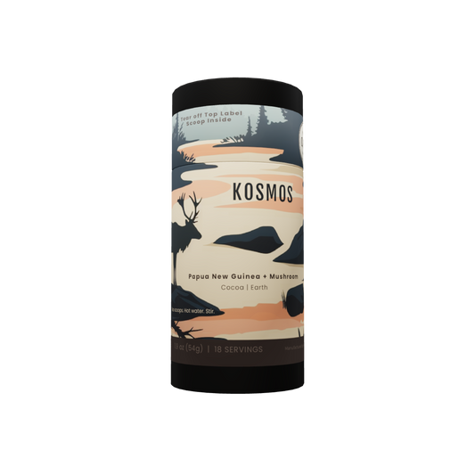 Kosmos instant mushroom coffee tube — caribou at dusk wrapping the 54 gram canister, Lion's Mane and Chaga on a Papua New Guinea single origin, 18 servings, scoop inside